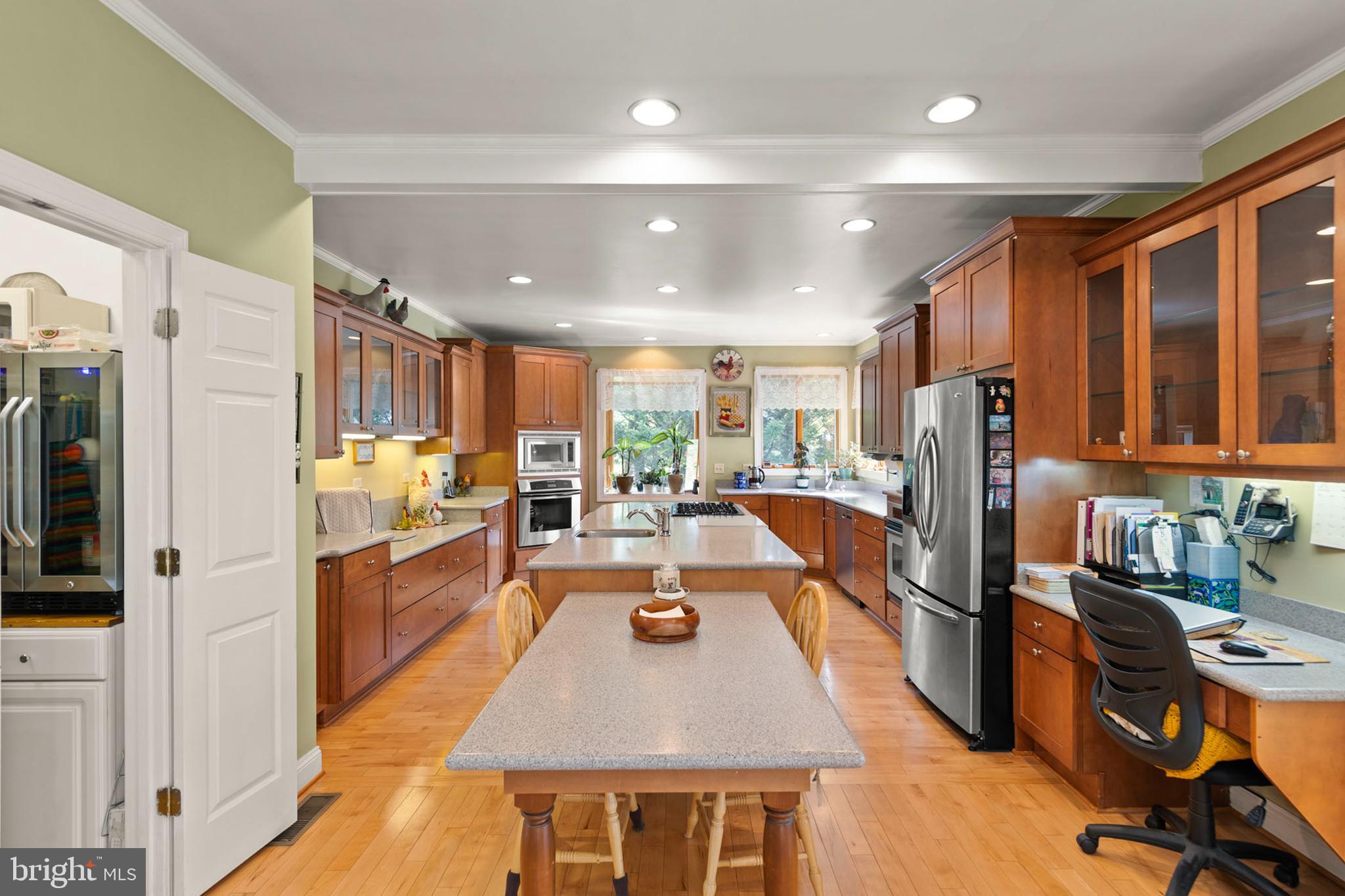 237 Aspen Trail Winchester, VA 22602 - Photo 5 of 69 a kitchen with stainless steel appliances granite countertop a refrigerator and a sink