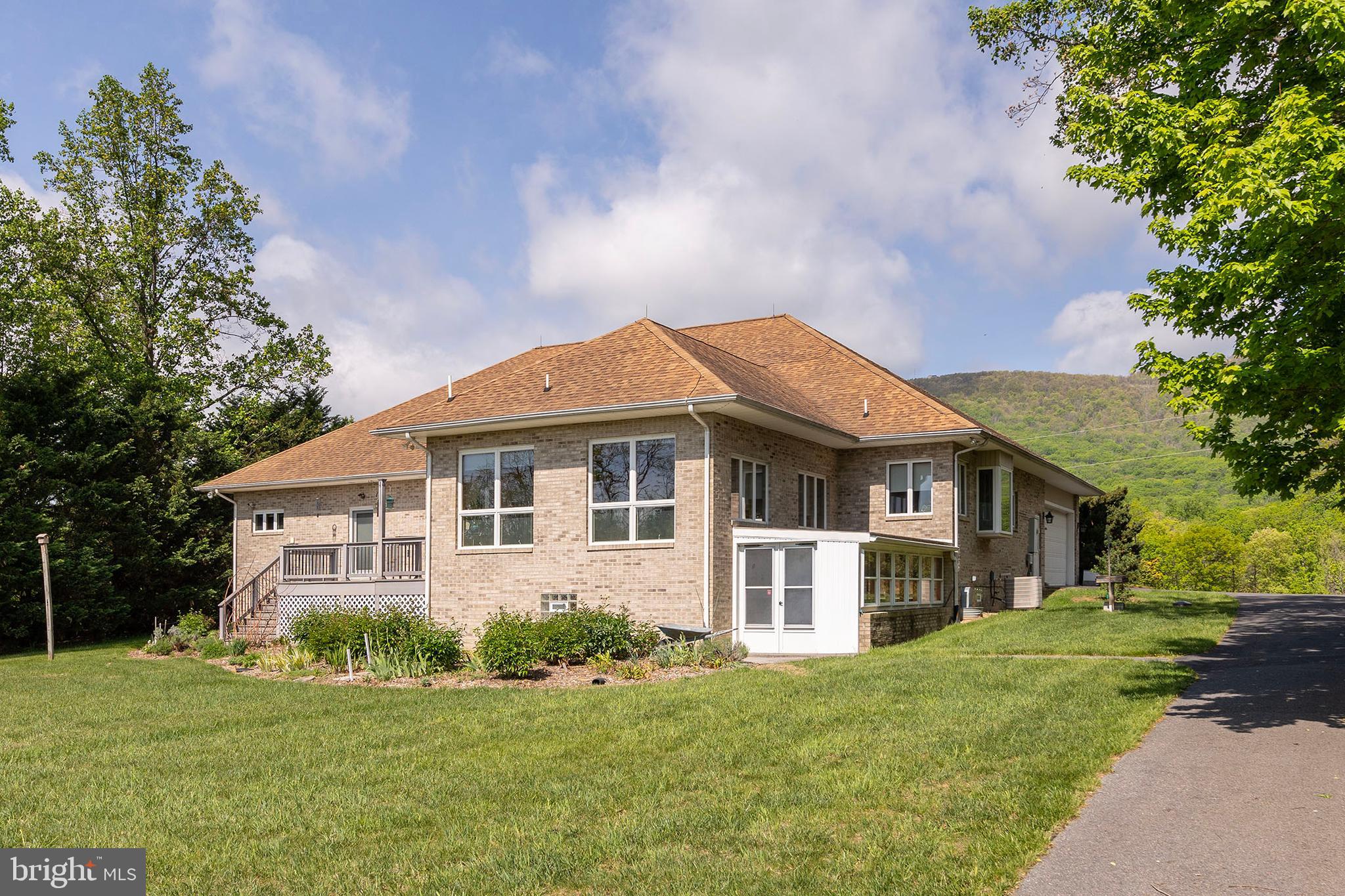 237 Aspen Trail Winchester, VA 22602 - Photo 51 of 69 a front view of a house with a garden