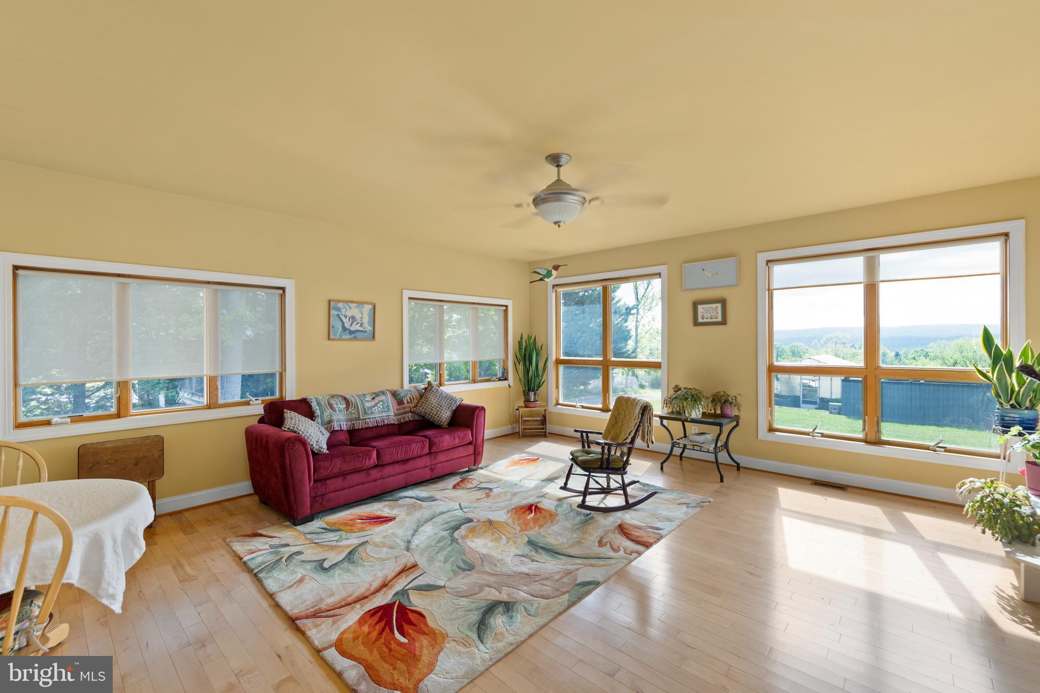 237 Aspen Trail Winchester, VA 22602 - Photo 6 of 69 a living room with furniture and a large window