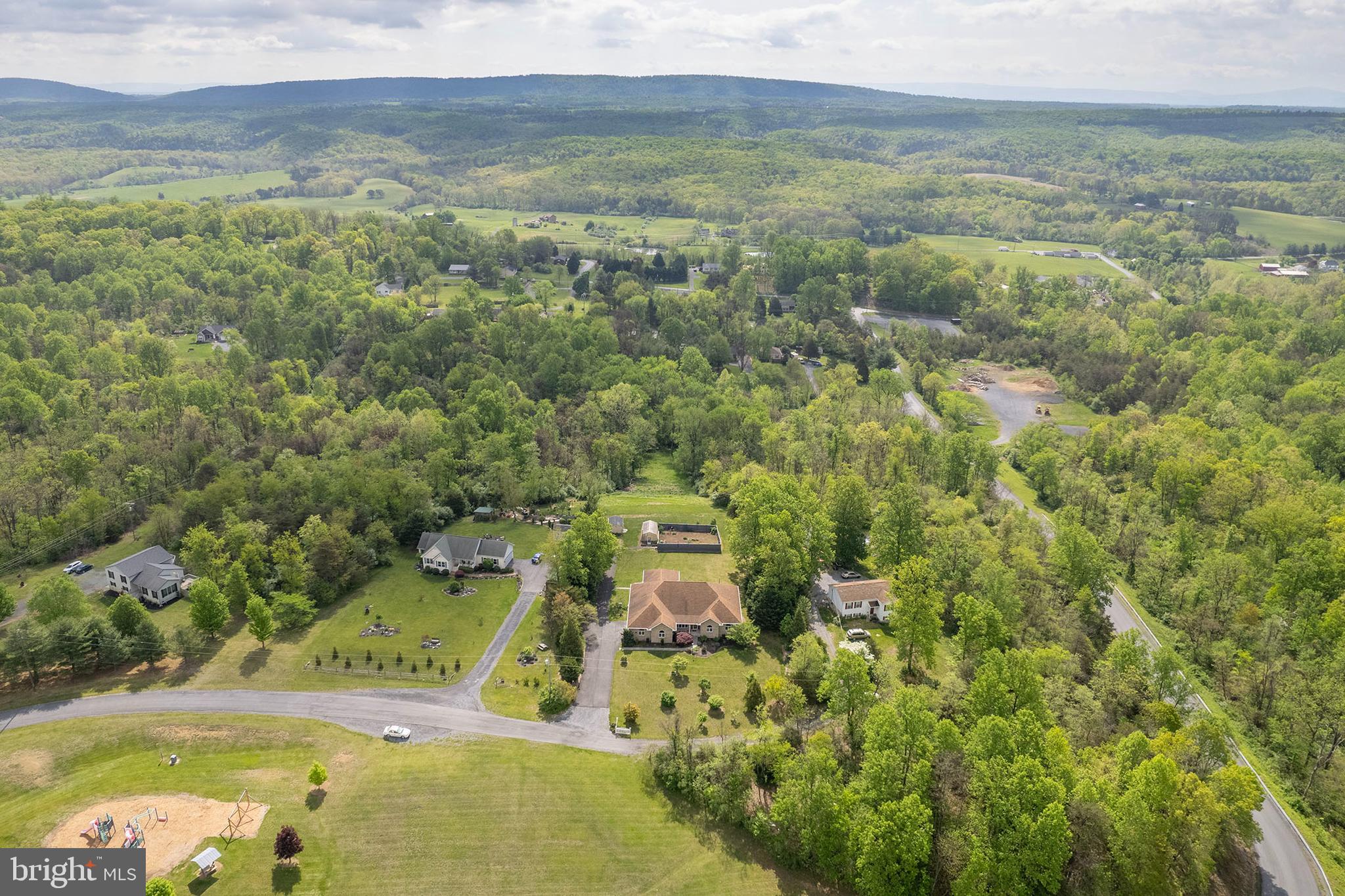 237 Aspen Trail Winchester, VA 22602 - Photo 63 of 69 an aerial view of residential houses with outdoor space and trees