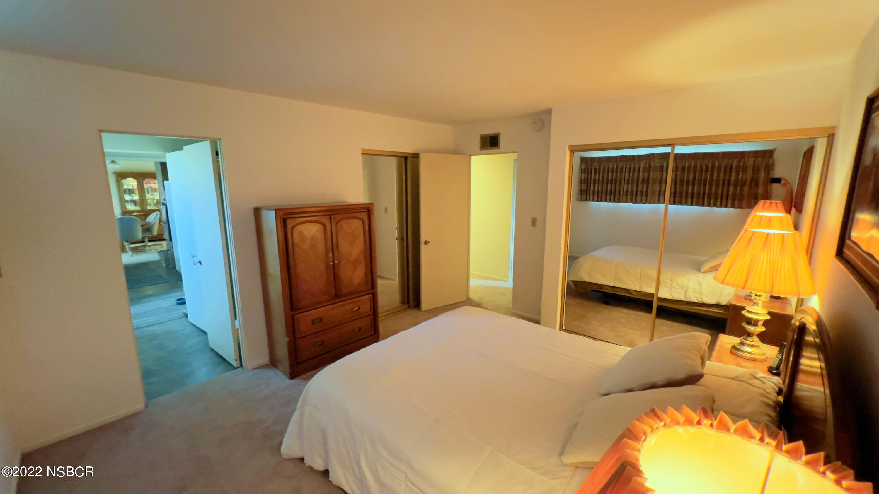 111 Mizar Place Lompoc, CA 93436 - Photo 27 of 31 a bedroom with a bed and wooden floor