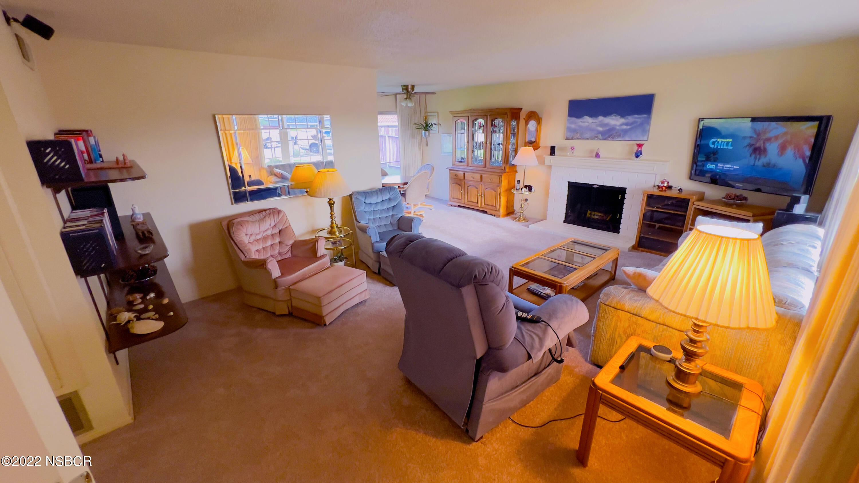 111 Mizar Place Lompoc, CA 93436 - Photo 7 of 31 a living room with furniture a flat screen tv and a bed