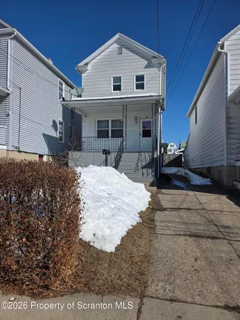 a view of a house with a patio