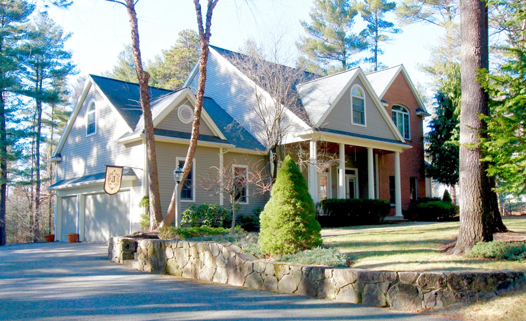 106 Flint Farm Road Middleton, MA 01949 - Photo 1 of 30 a front view of a house with garden