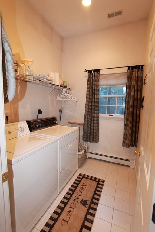 106 Flint Farm Road Middleton, MA 01949 - Photo 16 of 30 a utility room with dryer and washer