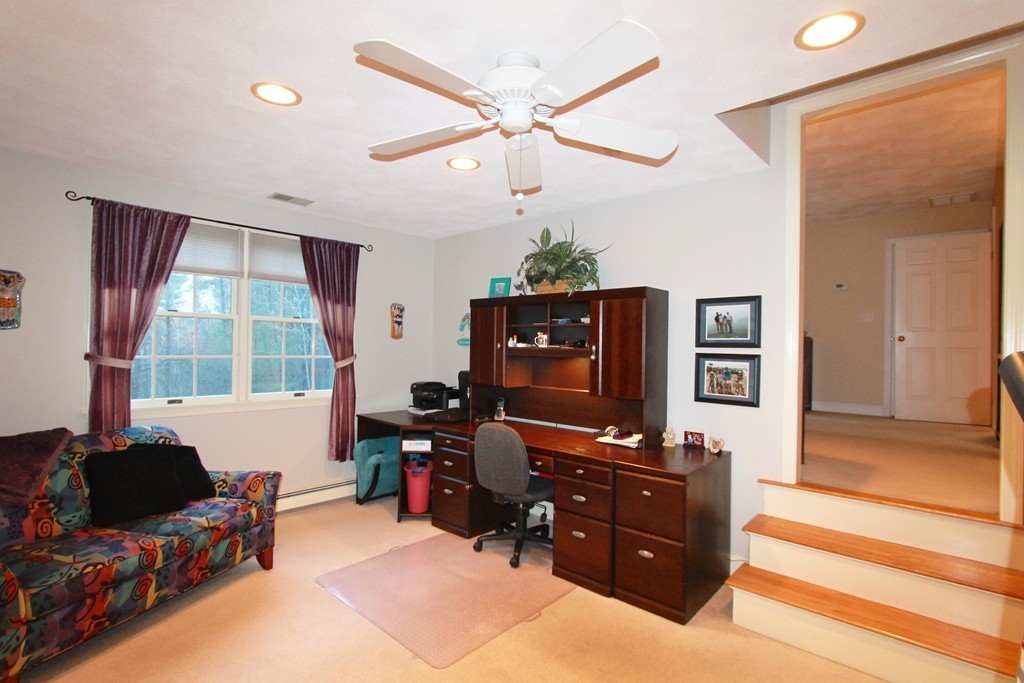 106 Flint Farm Road Middleton, MA 01949 - Photo 23 of 30 a room with furniture and flat screen tv