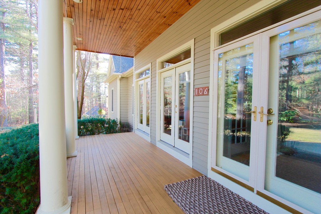 106 Flint Farm Road Middleton, MA 01949 - Photo 3 of 30 a view of a balcony with wooden floor