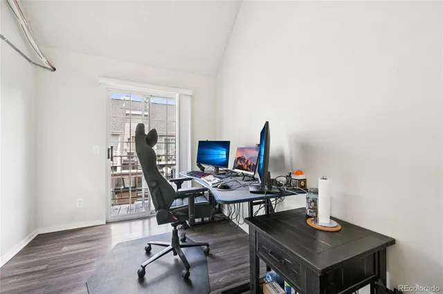a view of a workspace with furniture