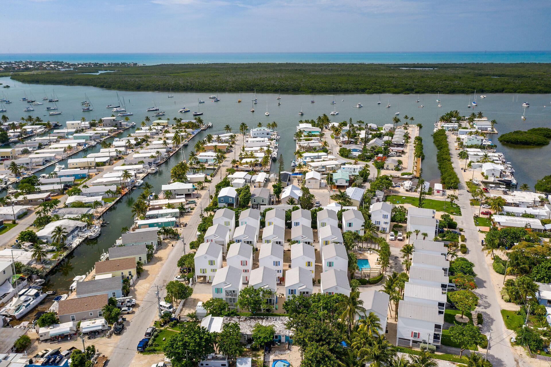 an aerial view of a house with a lake view