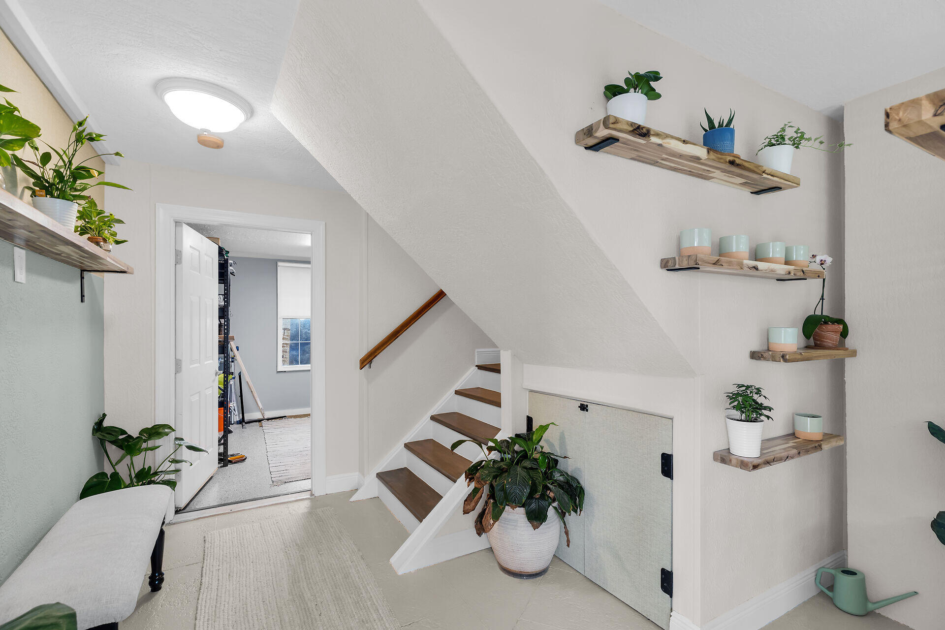 320 24th Street Ocean Marathon, FL 33050 - Photo 11 of 46 a white room with a potted plant