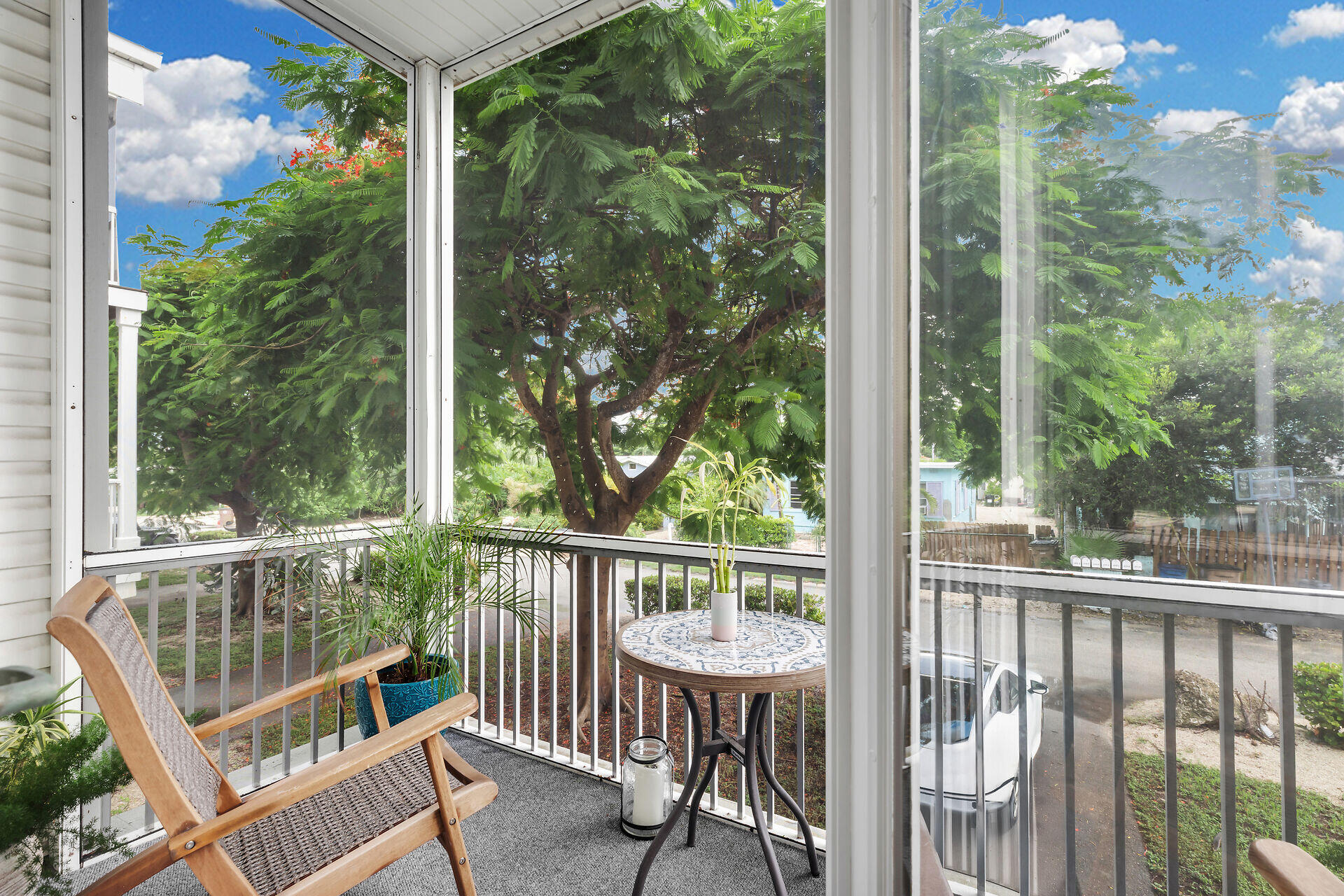 320 24th Street Ocean Marathon, FL 33050 - Photo 15 of 46 a view of a chair and table in the balcony