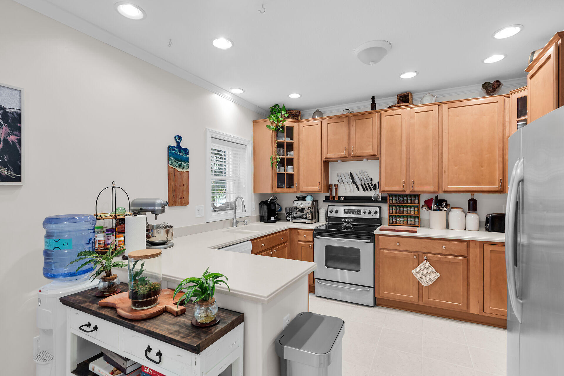 320 24th Street Ocean Marathon, FL 33050 - Photo 22 of 46 a kitchen with stainless steel appliances granite countertop a stove refrigerator sink and cabinets
