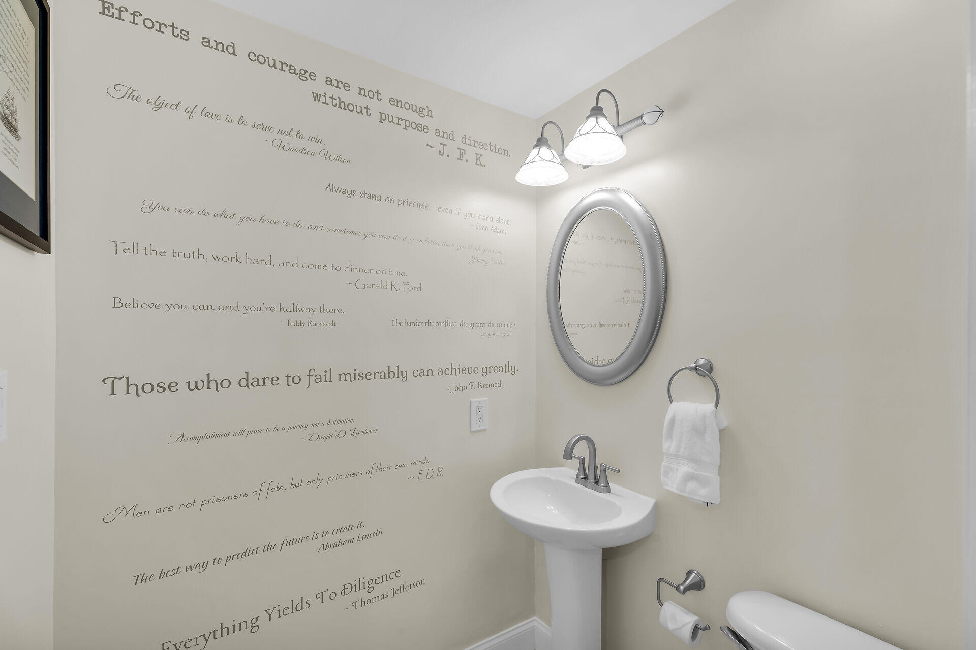 320 24th Street Ocean Marathon, FL 33050 - Photo 26 of 46 a bathroom with a sink a toilet and a mirror