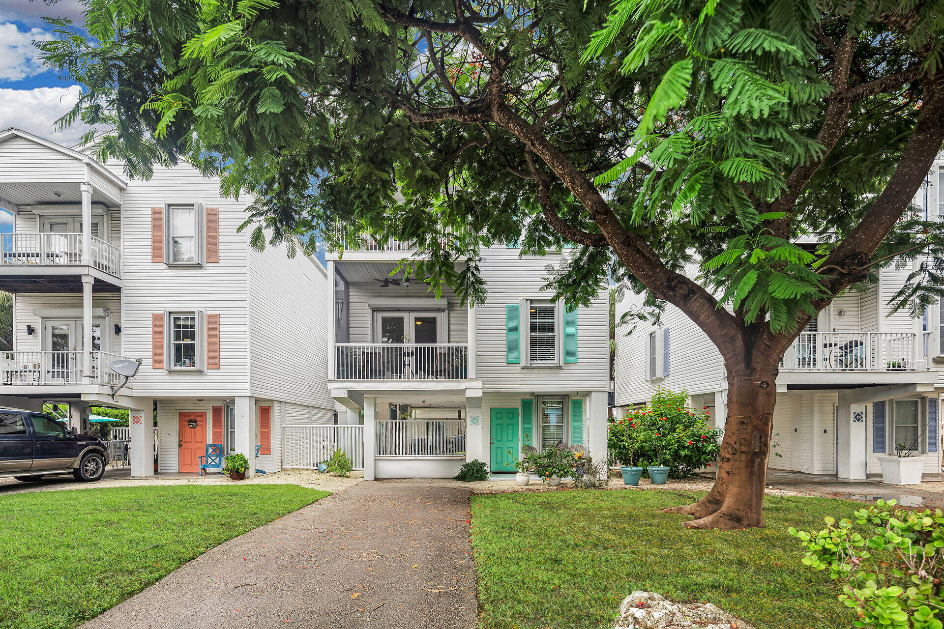 320 24th Street Ocean Marathon, FL 33050 - Photo 3 of 46 a view of building with yard