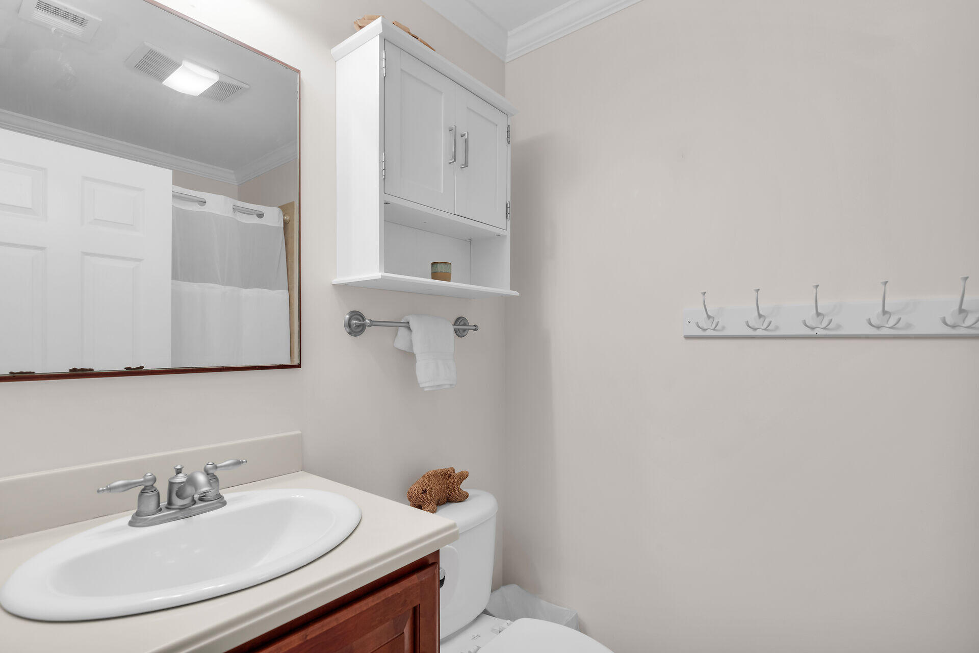 320 24th Street Ocean Marathon, FL 33050 - Photo 31 of 46 a bathroom with a sink toilet and mirror