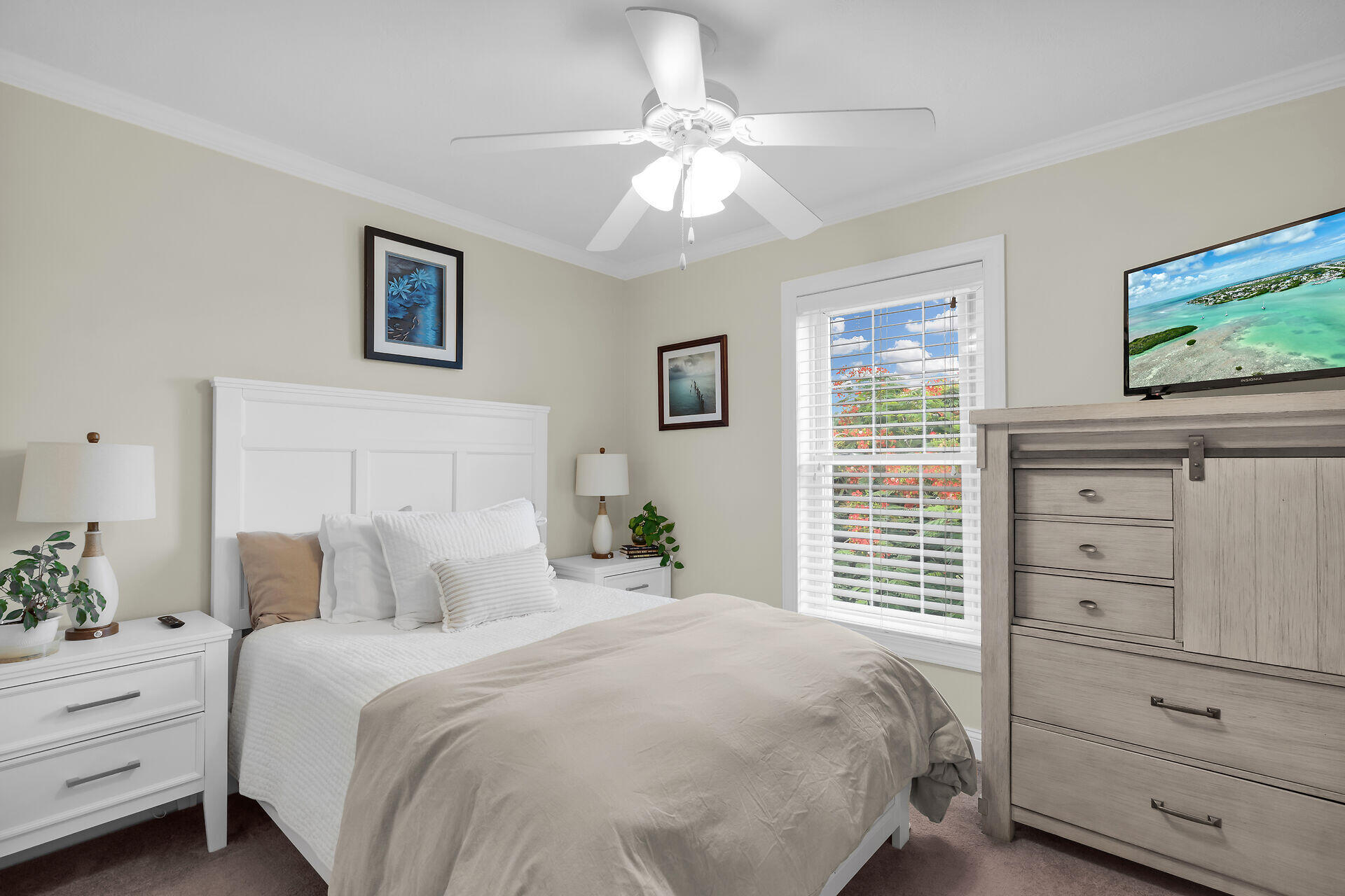 320 24th Street Ocean Marathon, FL 33050 - Photo 34 of 46 a bedroom with a large bed and a window