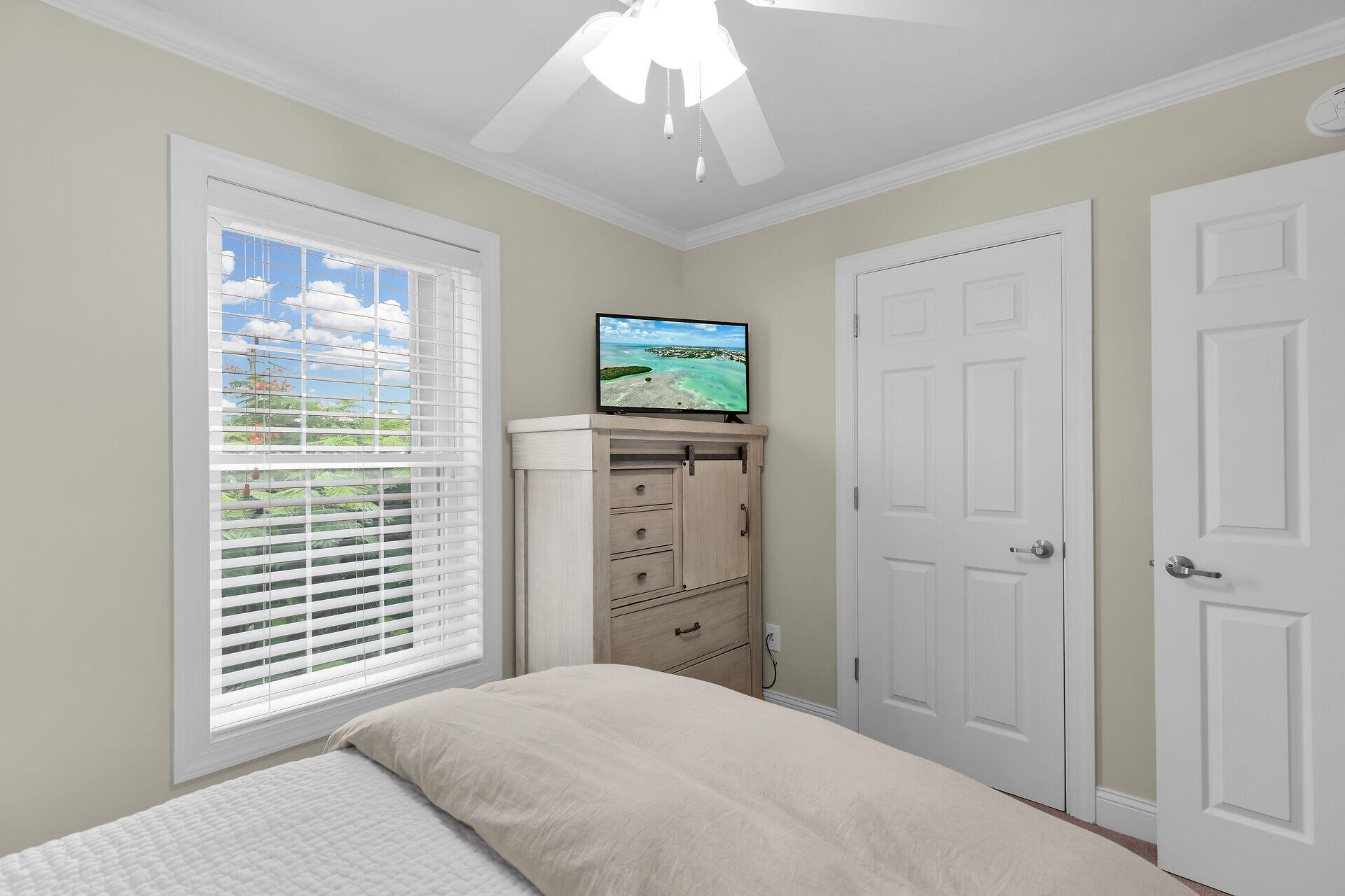 320 24th Street Ocean Marathon, FL 33050 - Photo 35 of 46 a bedroom with a bed and a window