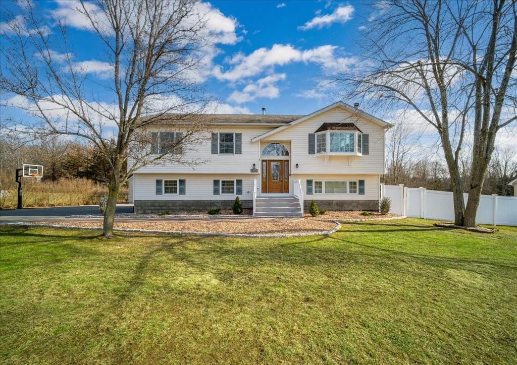 478 Lake Road New Windsor, NY 12553 - Photo 1 of 1 a view of a house with a big yard and large trees