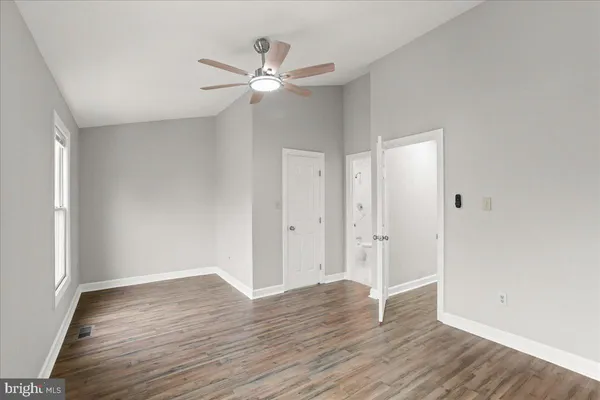 a view of an empty walk in closet