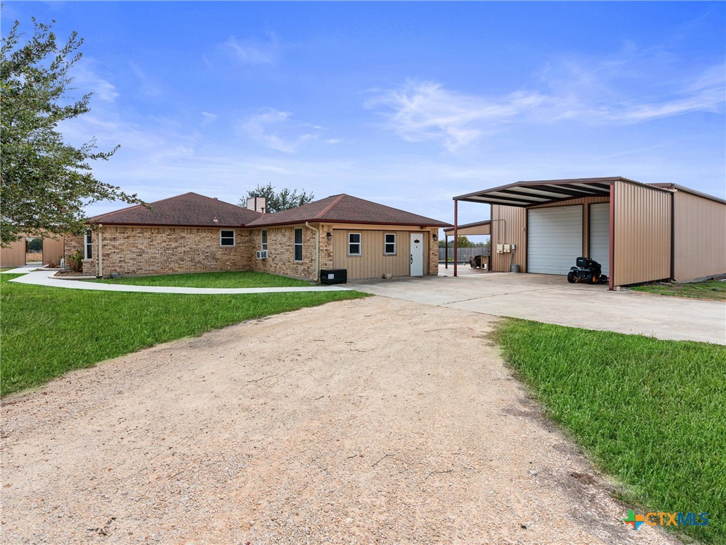 782 Santa Clara Loop Marion, TX 78124 - Photo 14 of 48 a view of a house with a yard and large tree