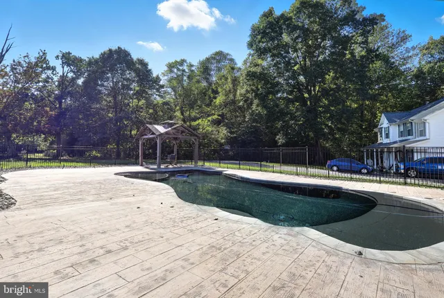 a view of outdoor space yard and swimming pool