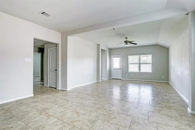 a view of an empty room and window