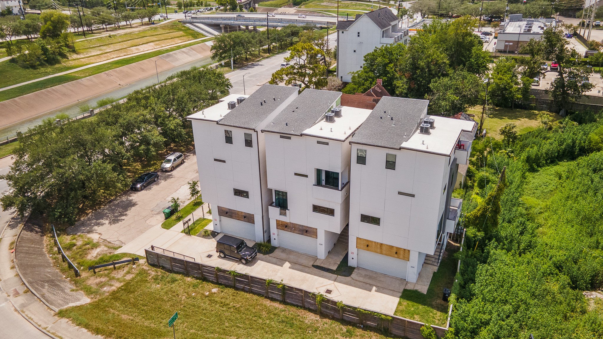 an aerial view of residential house with outdoor space and swimming pool
