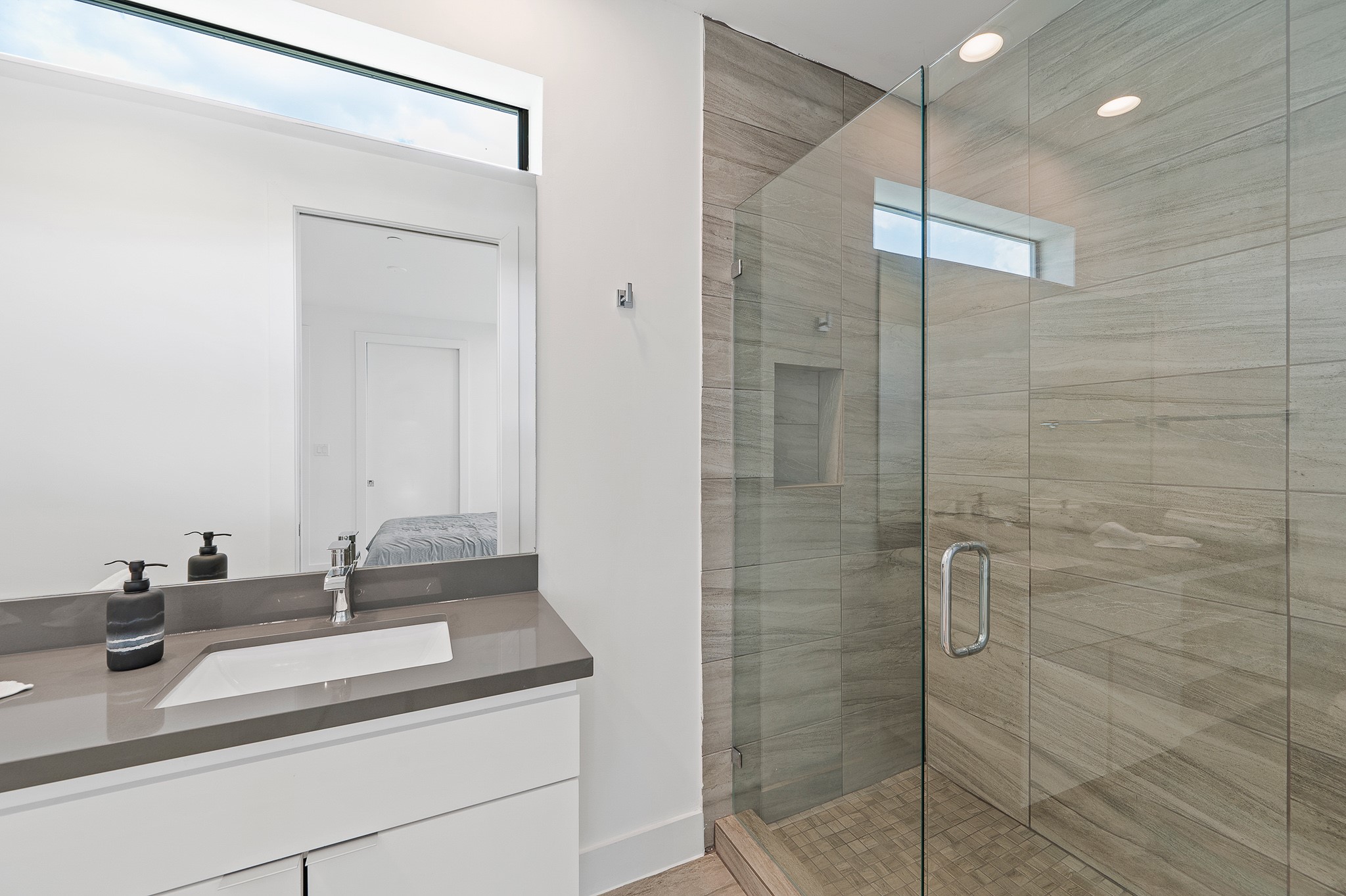 2239 North MacGregor Way Houston, TX 77004 - Photo 26 of 39 a bathroom with a sink and a mirror