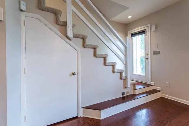 a view of entryway with wooden floor