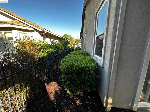 a view of living room with furniture and floor to ceiling window