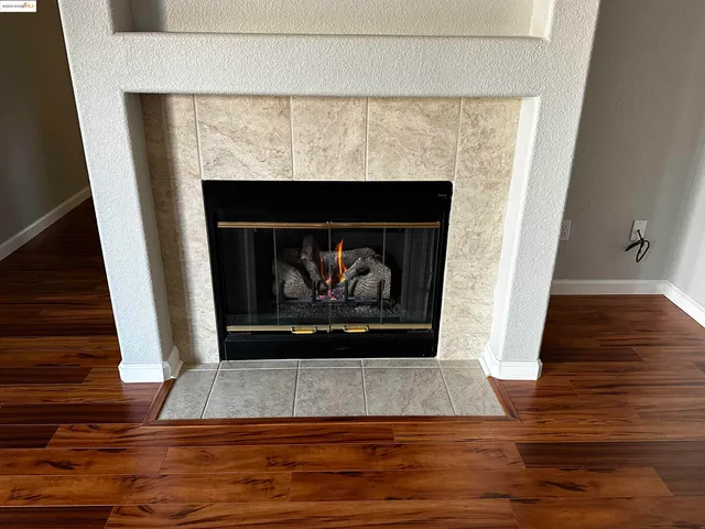 a living room with a fireplace