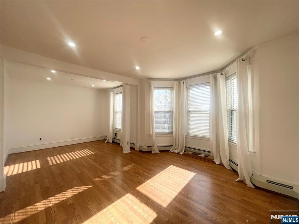 169 Magnolia Avenue, Unit 2 3 Kearny, NJ 07032 - Photo 7 of 23 a view of an empty room with a window