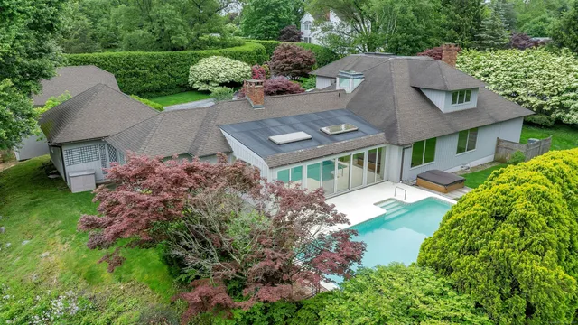 an aerial view of a house with a garden