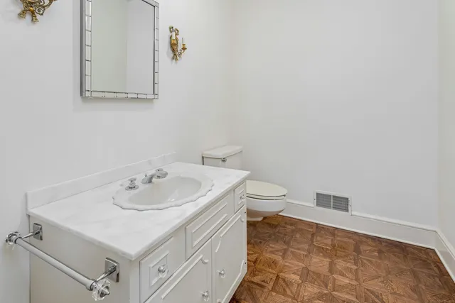 a bathroom with a sink and a toilet