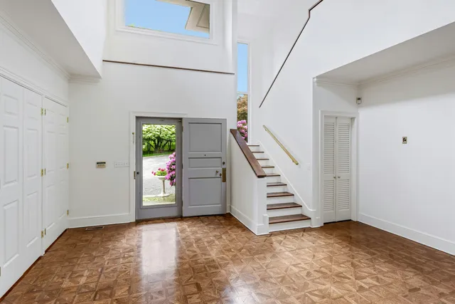 a view of an entryway with stairs
