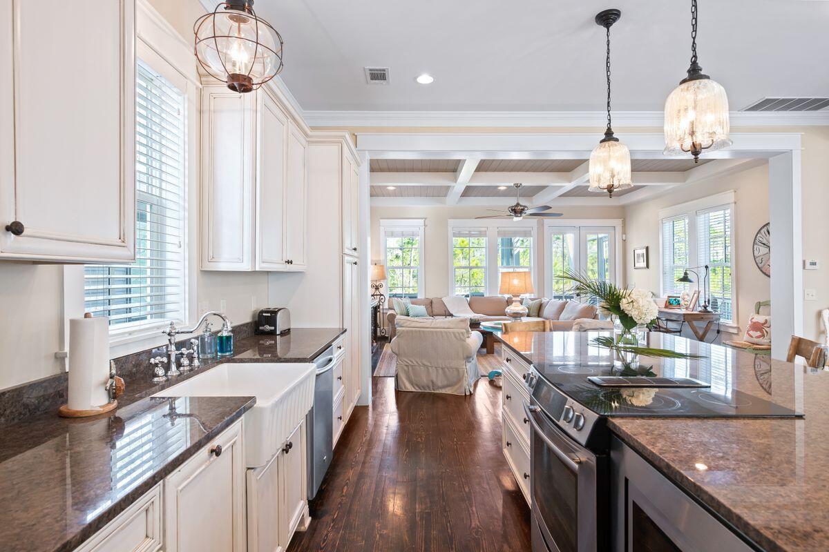 113 Lifeguard Loop West Inlet Beach, FL 32461 - Photo 14 of 51 a kitchen with sink stove and cabinets