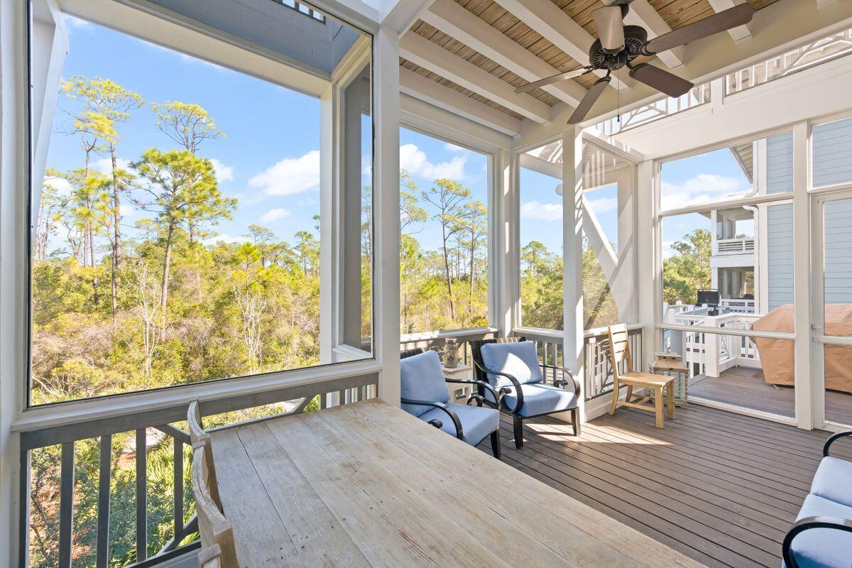 113 Lifeguard Loop West Inlet Beach, FL 32461 - Photo 20 of 51 a living room with furniture and floor to ceiling windows