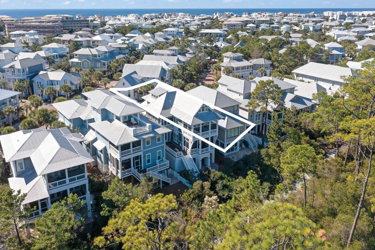113 Lifeguard Loop West Inlet Beach, FL 32461 - Photo 21 of 51 an aerial view of a residential apartment building with a yard