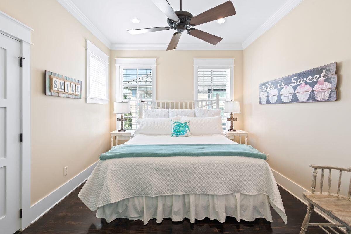 113 Lifeguard Loop West Inlet Beach, FL 32461 - Photo 22 of 51 a bedroom with a bed and window