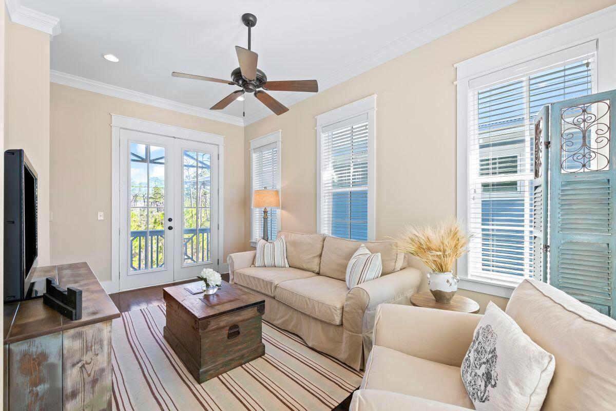113 Lifeguard Loop West Inlet Beach, FL 32461 - Photo 26 of 51 a living room with furniture and a large window