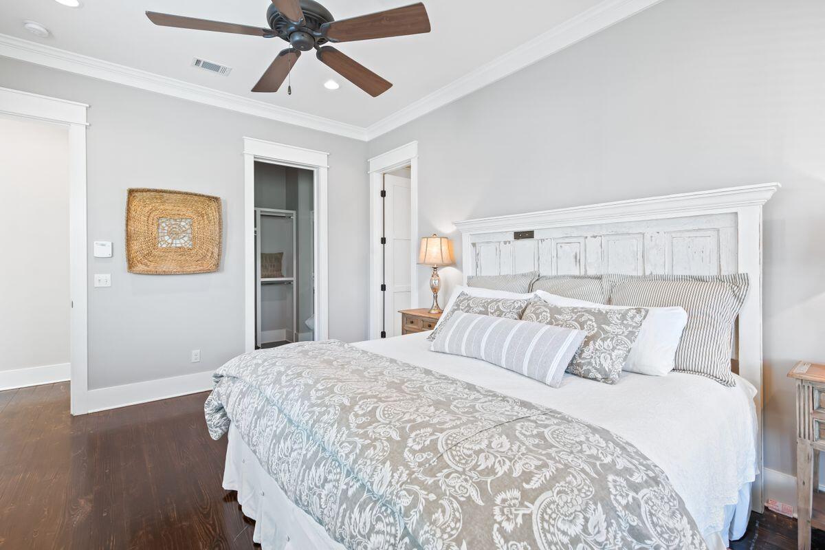 113 Lifeguard Loop West Inlet Beach, FL 32461 - Photo 29 of 51 a bedroom with a bed and painting on the wall