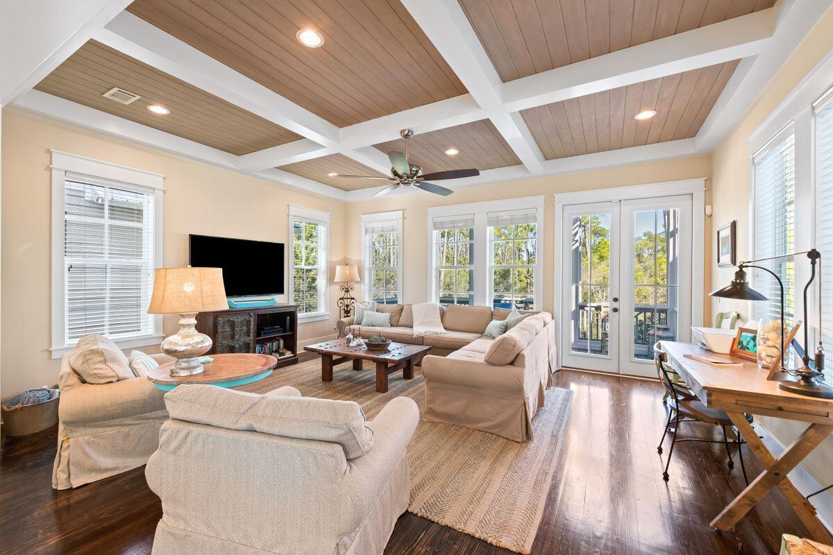 113 Lifeguard Loop West Inlet Beach, FL 32461 - Photo 3 of 51 a living room with furniture a flat screen tv and a large window