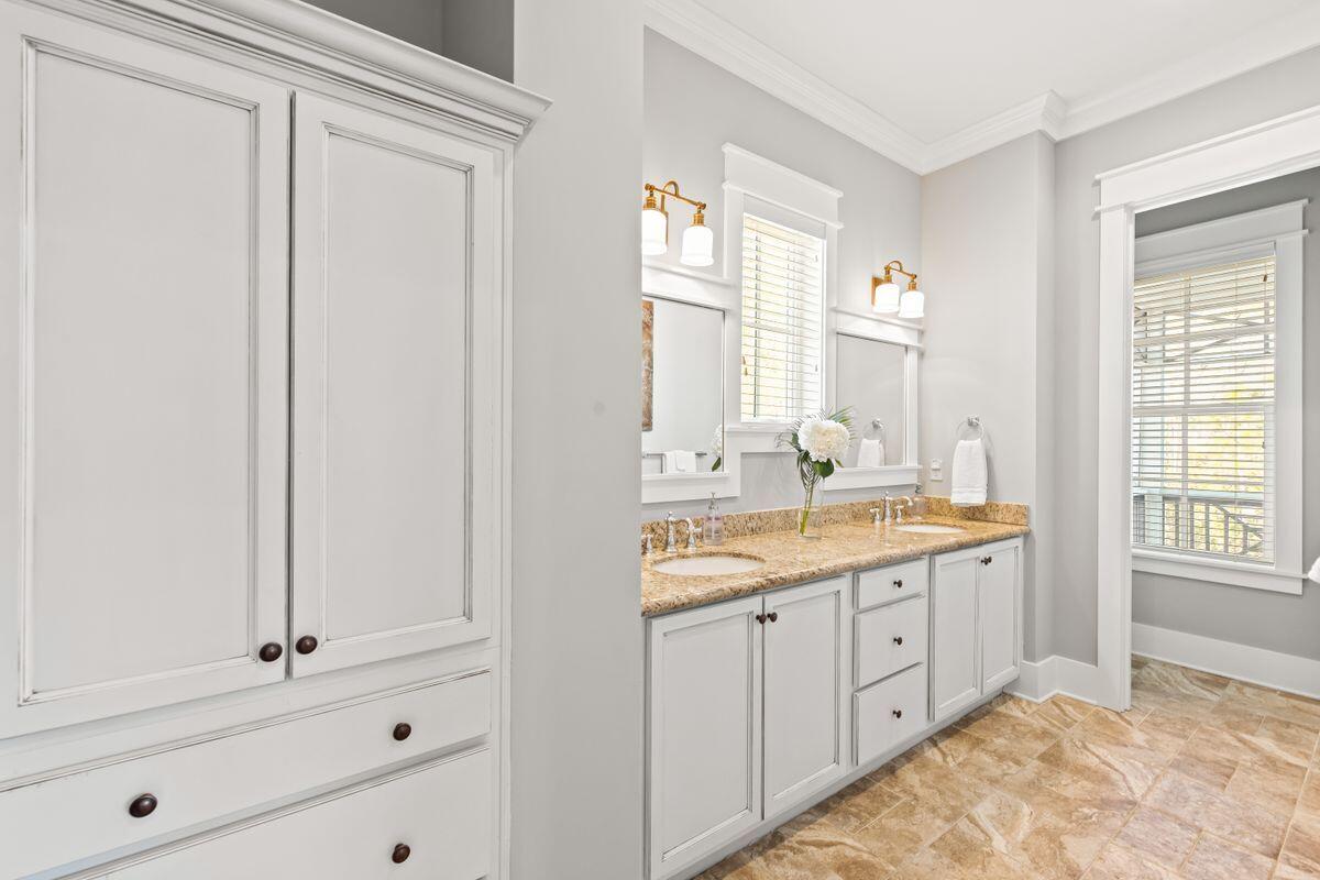 113 Lifeguard Loop West Inlet Beach, FL 32461 - Photo 31 of 51 a bathroom with a granite countertop sink and a mirror