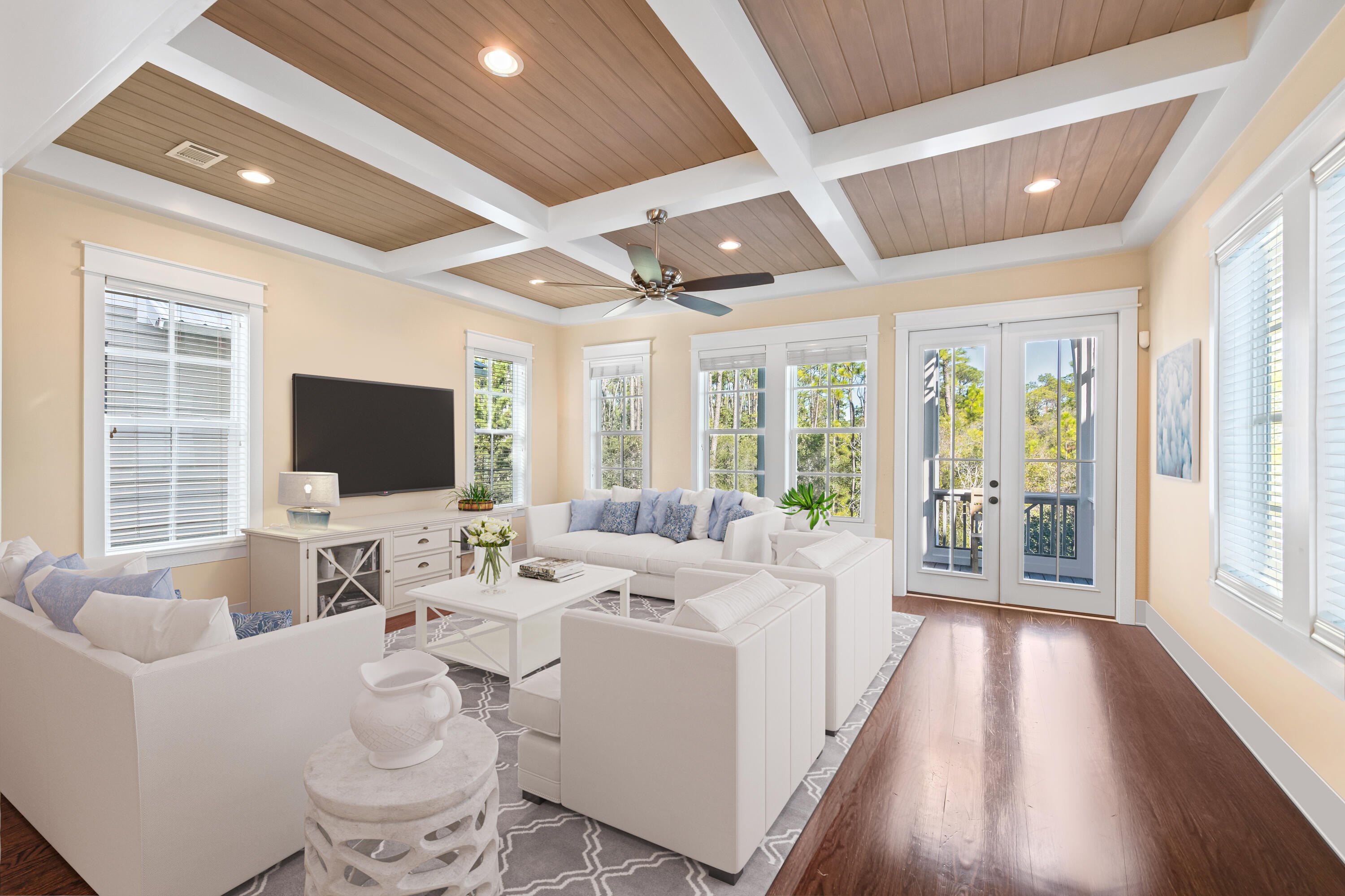 113 Lifeguard Loop West Inlet Beach, FL 32461 - Photo 4 of 51 a living room with furniture a flat screen tv and a large window