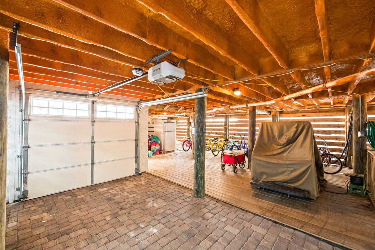 113 Lifeguard Loop West Inlet Beach, FL 32461 - Photo 43 of 51 a view of a room with racks on the wall