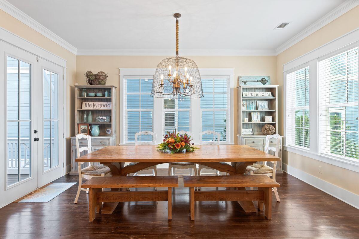 113 Lifeguard Loop West Inlet Beach, FL 32461 - Photo 6 of 51 a dining table with chairs and wooden floor