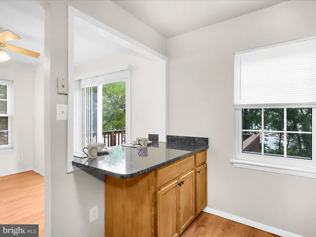 a bathroom with a sink and a window