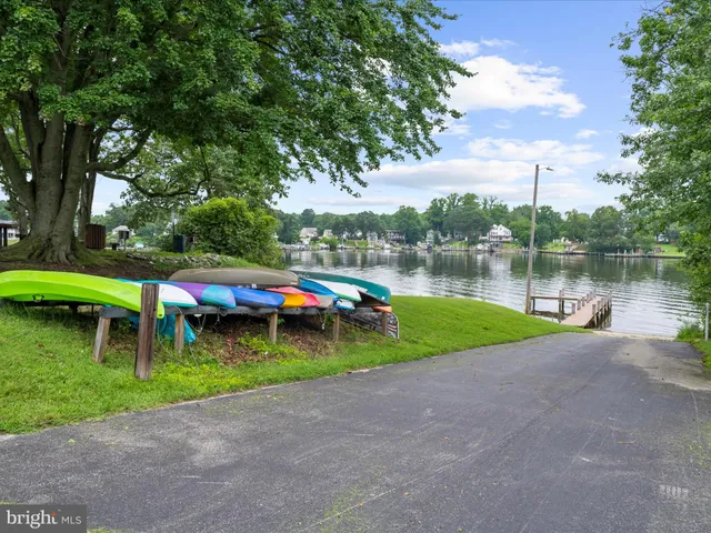a view of a backyard with sitting area