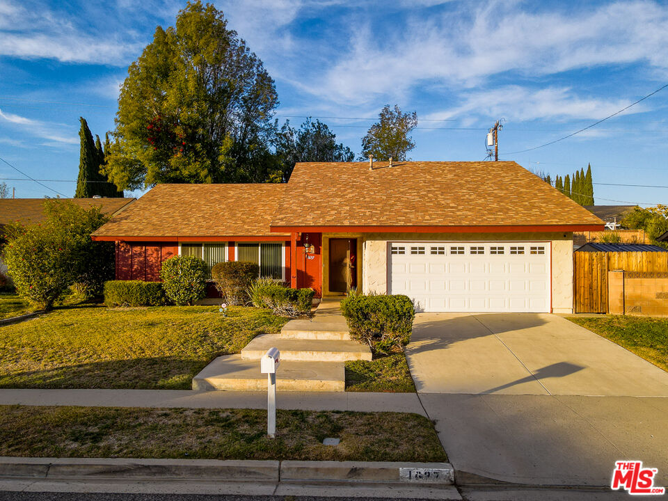 1637 Downing Street Simi Valley, CA 93065 - Photo 1 of 26 a front view of house with yard