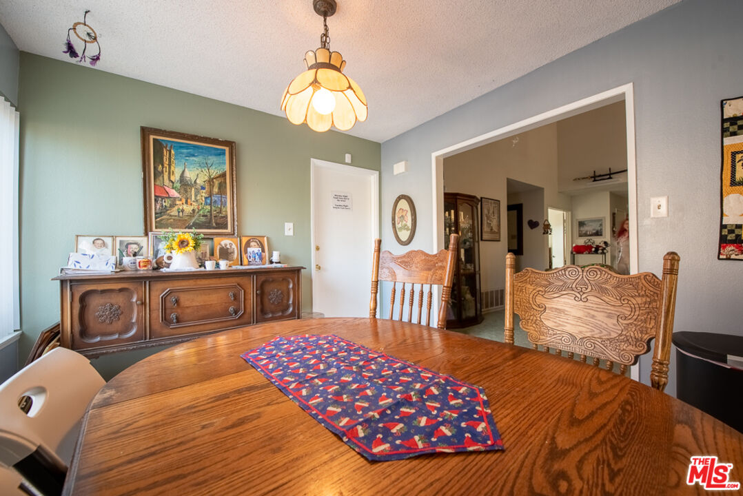 1637 Downing Street Simi Valley, CA 93065 - Photo 15 of 26 a bedroom with furniture and a wooden floor